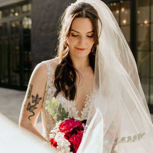 Bride in her veil, makeup by Bryanna